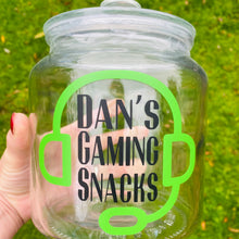 Load image into Gallery viewer, personalised gaming snack jar with lid, headphone image with name's gaming snacks on the front