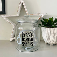 Load image into Gallery viewer, personalised gaming snack jar with lid, headphone image with name's gaming snacks on the front