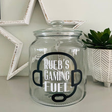 Load image into Gallery viewer, personalised gaming snack jar with lid, headphone image with name's gaming snacks on the front