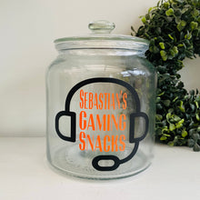 Load image into Gallery viewer, personalised gaming snack jar with lid, headphone image with name's gaming snacks on the front