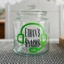 Load image into Gallery viewer, personalised gaming snack jar with lid, headphone image with name's gaming snacks on the front