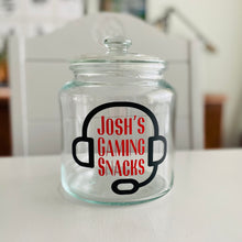 Load image into Gallery viewer, personalised gaming snack jar with lid, headphone image with name's gaming snacks on the front