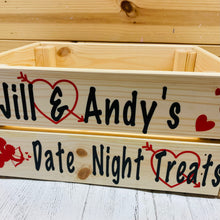 Load image into Gallery viewer, Wooden crate with your names and date night treats on it with hearts and cupid