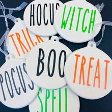 Load image into Gallery viewer, white bauble with black string and the word trick, treat, boo, hocus or pocus