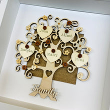 Load image into Gallery viewer, wooden family tree with names on hearts and coloured buttons in a frame