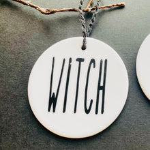 Load image into Gallery viewer, white bauble with black string and the word witch