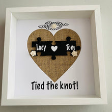 Load image into Gallery viewer, framed wedding gift with names on jigsaw pieces cream roses and tied the knot text