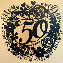 Load image into Gallery viewer, black floral wreath image with 50 in the middle and a gold background with wedding anniversary details around the wreath in black frame