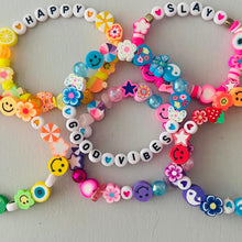Load image into Gallery viewer, bright coloured mixed beaded elasticated bracelet with the words good vibes
