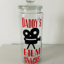 Load image into Gallery viewer, glass personalised film night snack jar with red text and black video camera image
