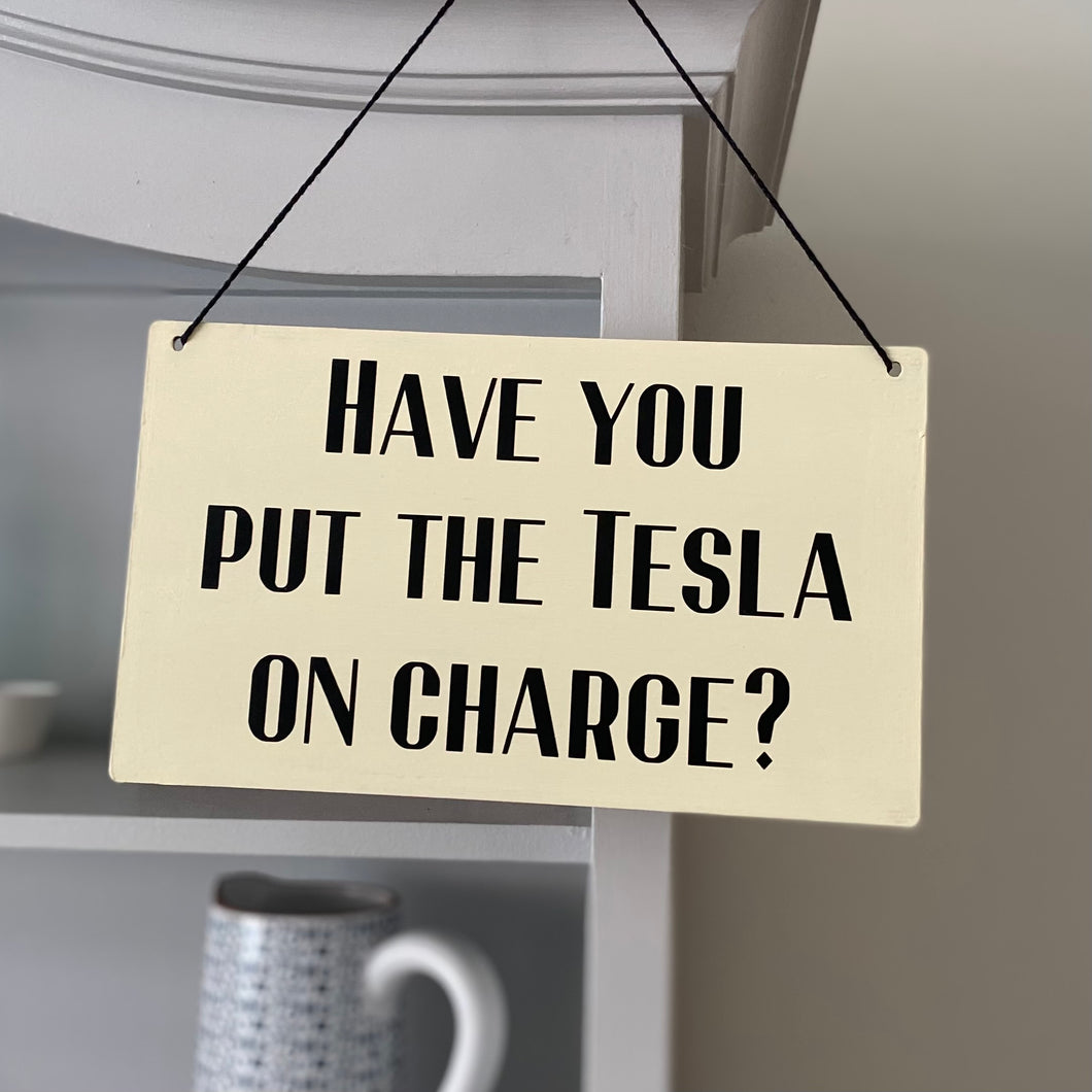 Tesla Charging Reminder Sign