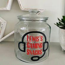 Load image into Gallery viewer, personalised gaming snack jar with lid, headphone image with name&#39;s gaming snacks on the front
