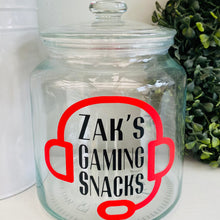 Load image into Gallery viewer, personalised gaming snack jar with lid, headphone image with name&#39;s gaming snacks on the front
