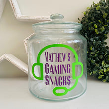 Load image into Gallery viewer, personalised gaming snack jar with lid, headphone image with name&#39;s gaming snacks on the front
