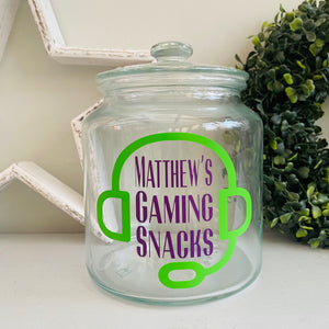 personalised gaming snack jar with lid, headphone image with name's gaming snacks on the front