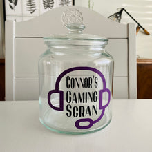 Load image into Gallery viewer, personalised gaming snack jar with lid, headphone image with name&#39;s gaming snacks on the front
