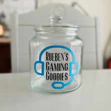 Load image into Gallery viewer, personalised gaming snack jar with lid, headphone image with name&#39;s gaming snacks on the front
