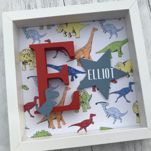dinosaur themed frame with personalised initial and dinosaur shape