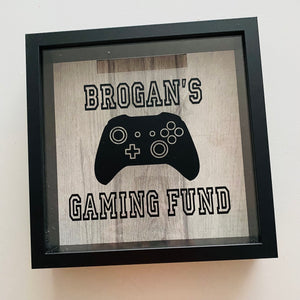 personalised gaming fund money box in a frame with controller image