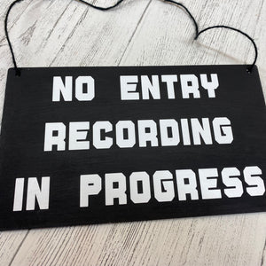 no entry recording in progress sign