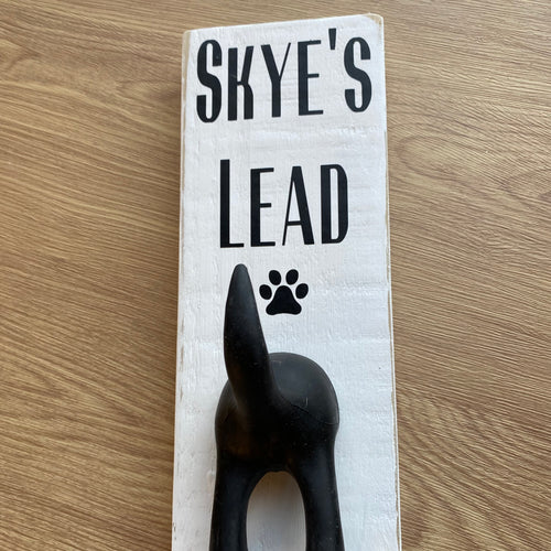 personalised wooden dog lead plaque with black dog tail hook