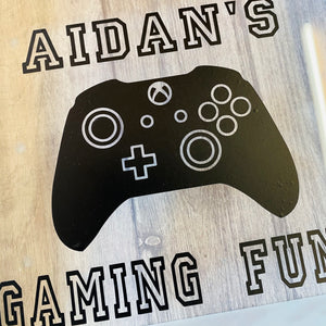 personalised gaming fund money box in a frame with controller image