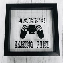 Load image into Gallery viewer, personalised gaming fund money box in a frame with controller image
