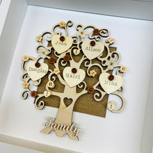 Load image into Gallery viewer, wooden family tree with names on hearts and coloured buttons in a frame
