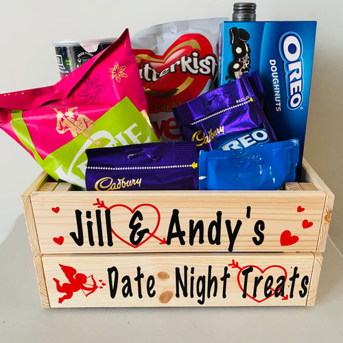 Wooden crate with your names and date night treats on it with hearts and cupid