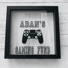 Load image into Gallery viewer, personalised gaming fund money box in a frame with controller image
