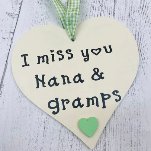hanging heart with gingham ribbon personalised with i miss you nana and gramps