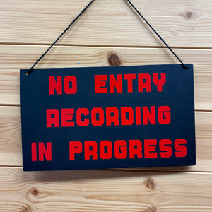 no entry recording in progress sign