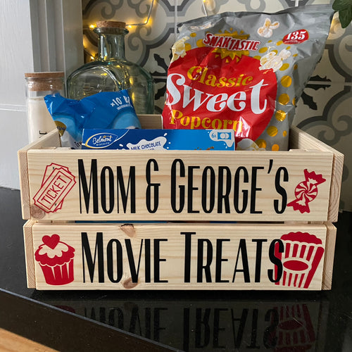 natural wooden crate personalised with your choice of text with popcorn sweet cupcake and ticket image