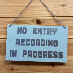 no entry recording in progress sign