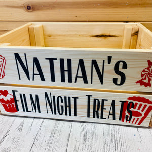 natural wooden crate personalised with your choice of text with popcorn sweet cupcake and ticket image