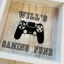 Load image into Gallery viewer, personalised gaming fund money box in a frame with controller image
