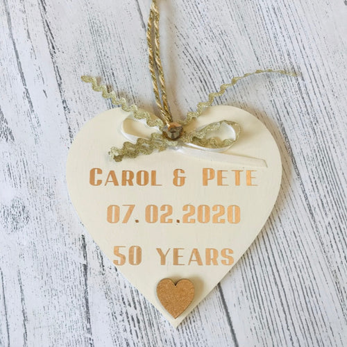 cream hanging heart personalised with names and date of golden wedding anniversary