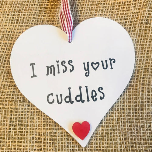 hand painted heart with I miss your cuddles text and gingham ribbon hanger