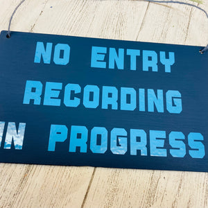 no entry recording in progress sign