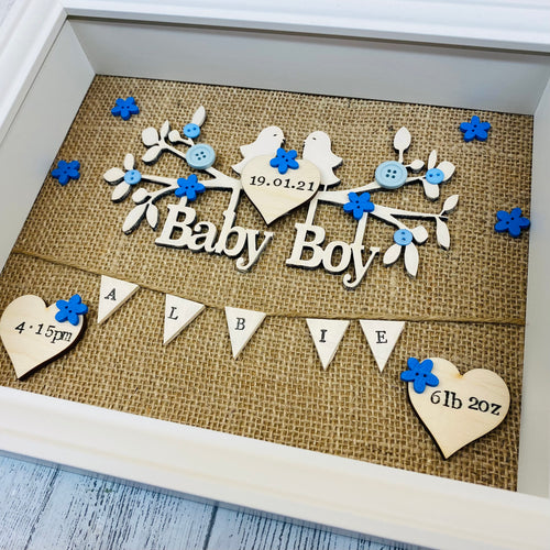 personalised new baby boy gift with birth details and blue buttons