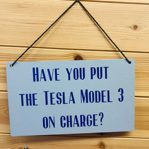 Tesla Charging Reminder Sign